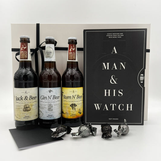 Boxen til mænd med øl og bogen om ure